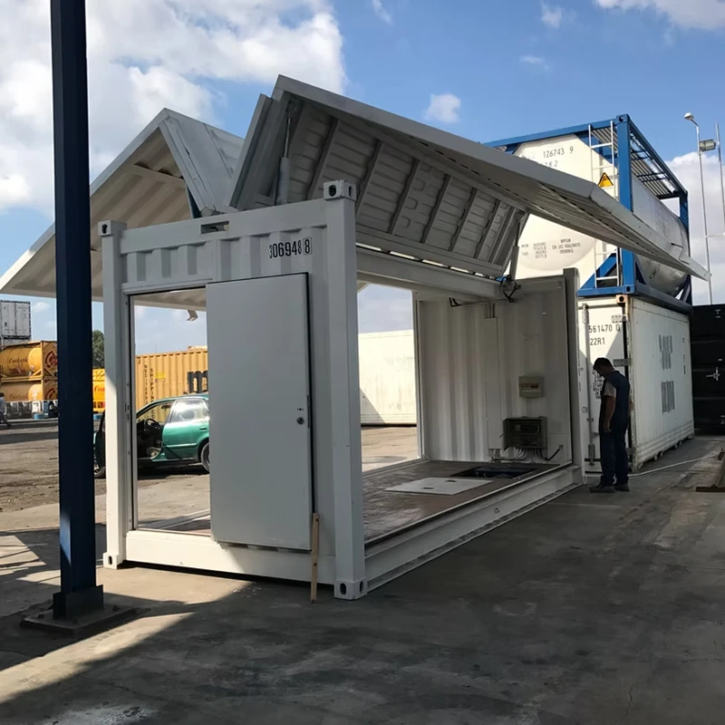 Hydraulisk sideåbningsbeholder